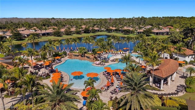 birds eye view of property with a water view