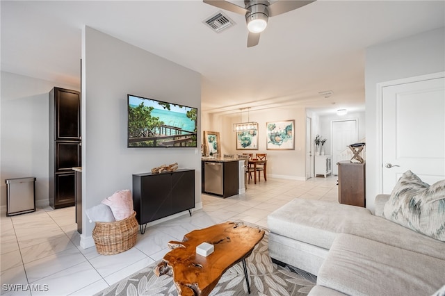 living room with marble finish floor, ceiling fan, visible vents, and baseboards