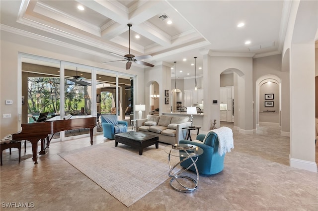 living room with arched walkways, visible vents, coffered ceiling, and a high ceiling