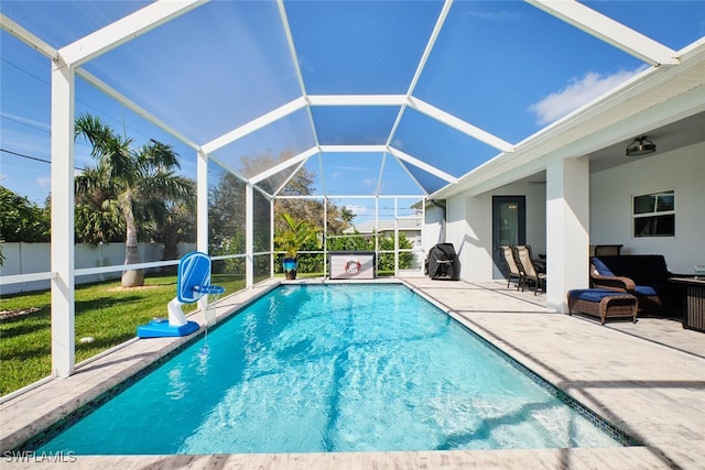 view of swimming pool with a fenced in pool, a lanai, a patio, and fence