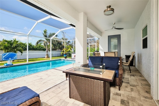 view of swimming pool with a fenced in pool, ceiling fan, fence, a patio area, and outdoor lounge area