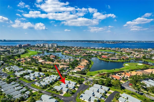 aerial view featuring a water view and a residential view