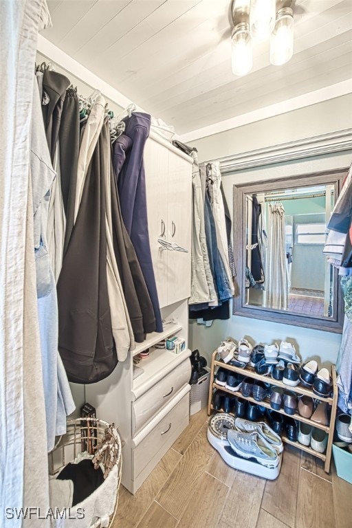 spacious closet featuring wood tiled floor