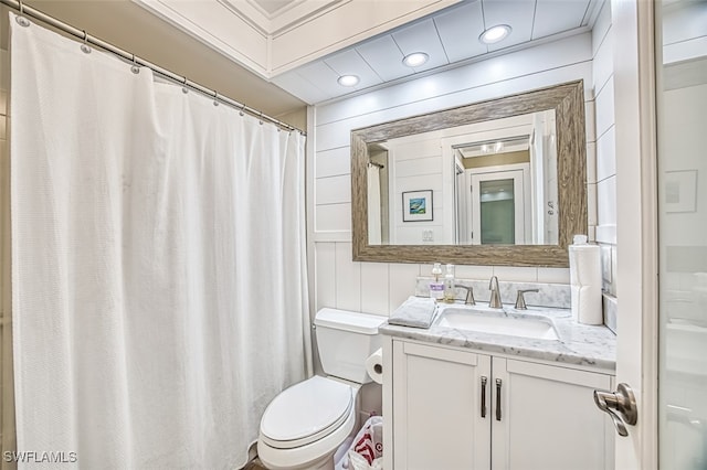 full bath with toilet, recessed lighting, and vanity