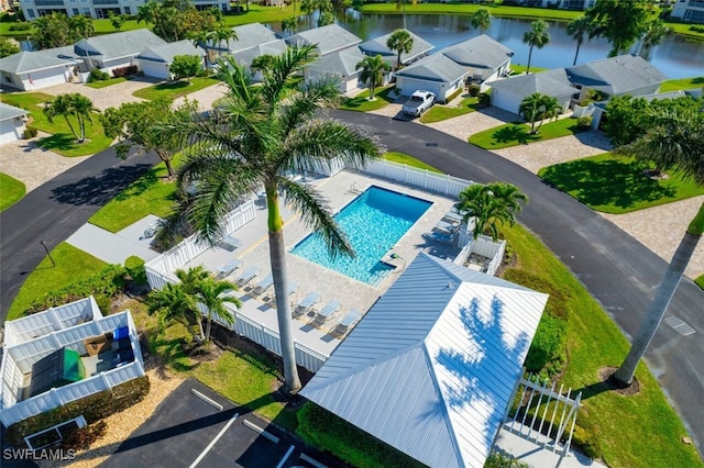 aerial view with a water view and a residential view