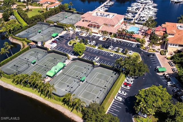 birds eye view of property with a water view