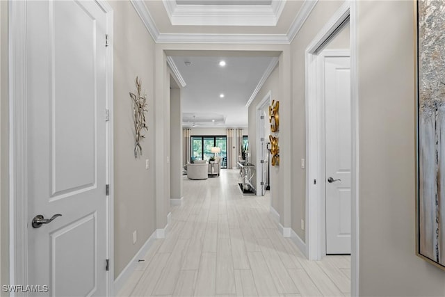 corridor with recessed lighting, baseboards, light wood-style floors, and crown molding