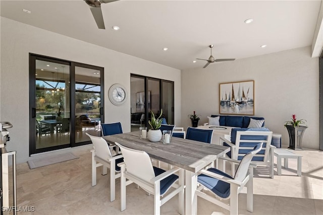 view of patio / terrace featuring outdoor dining area and a ceiling fan