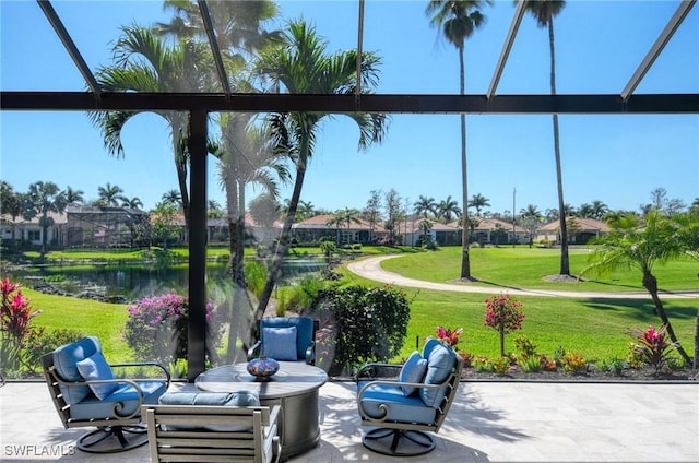 view of patio featuring a water view