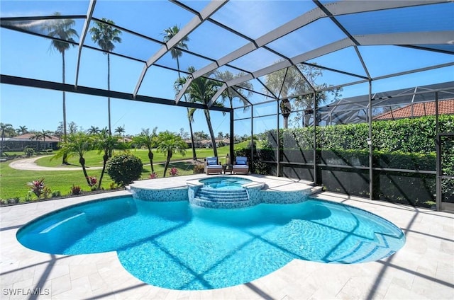 view of swimming pool with glass enclosure, a yard, a patio, and a pool with connected hot tub