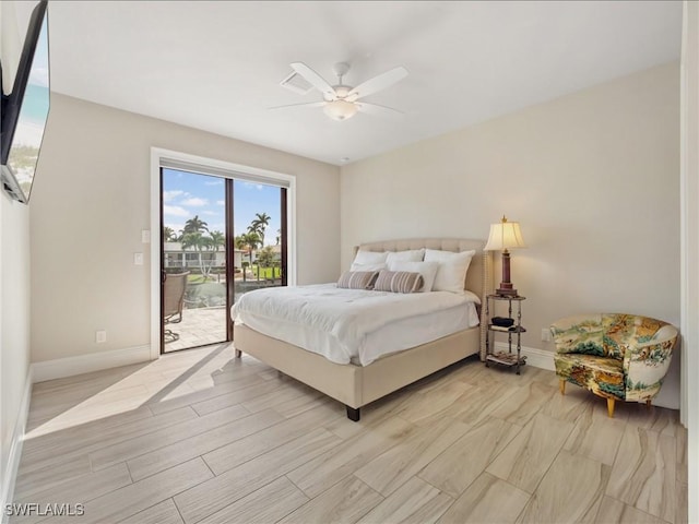 bedroom featuring access to outside, baseboards, ceiling fan, and light wood-style flooring