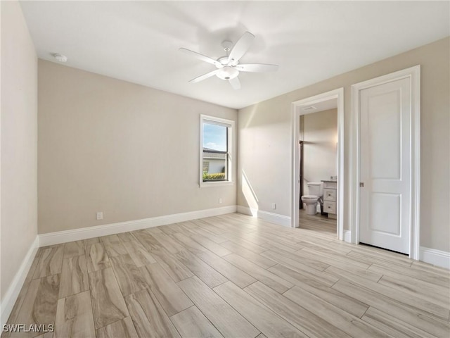 unfurnished bedroom featuring light wood finished floors, ceiling fan, and baseboards