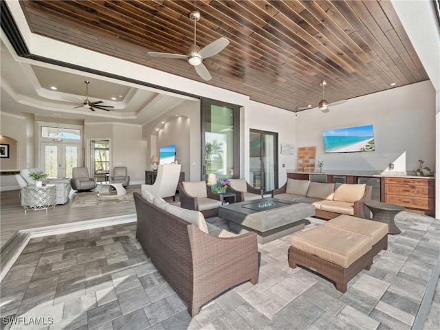 view of patio featuring outdoor lounge area, a ceiling fan, and area for grilling