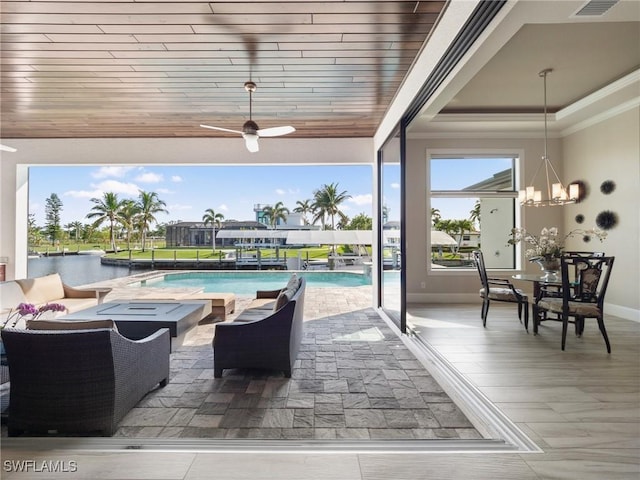 view of patio / terrace with visible vents, an outdoor pool, and a ceiling fan