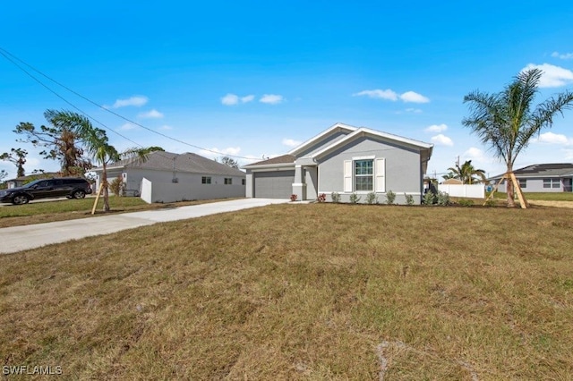 ranch-style house with an attached garage, driveway, and a front lawn