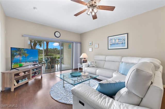 living area with ceiling fan and wood finished floors