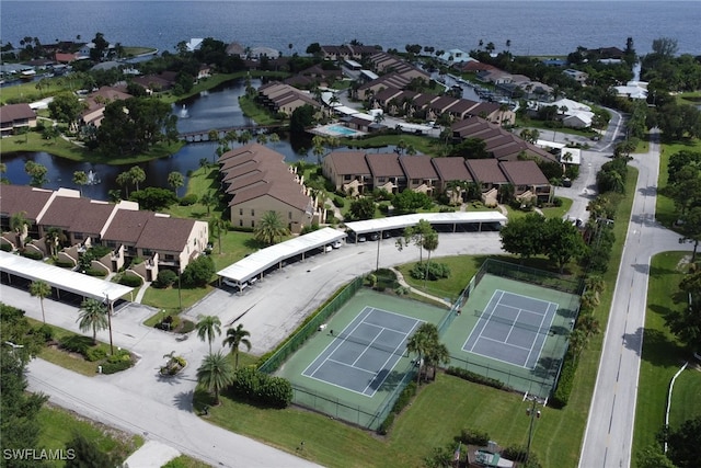 bird's eye view with a residential view and a water view