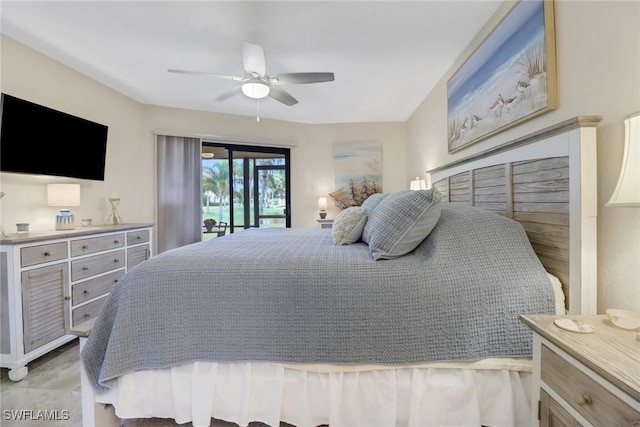 bedroom with access to exterior and ceiling fan