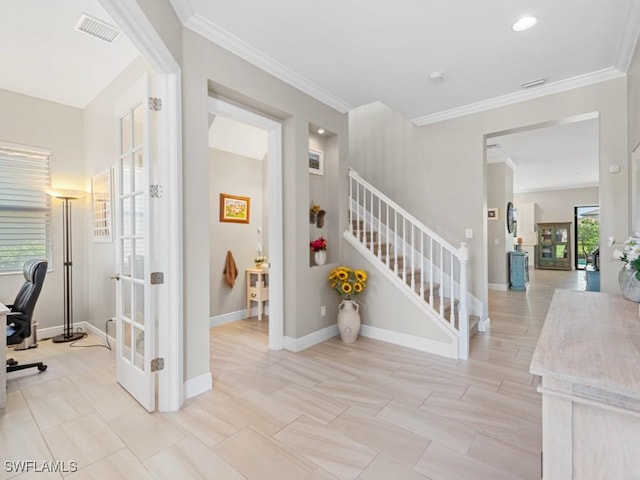 stairs featuring ornamental molding, french doors, visible vents, and baseboards