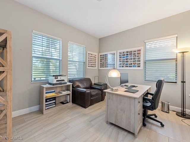 home office featuring baseboards