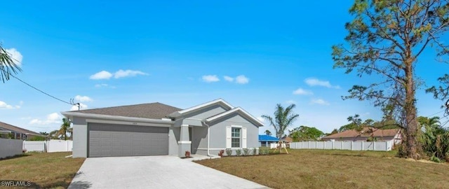 ranch-style home with an attached garage, fence, driveway, and a front lawn