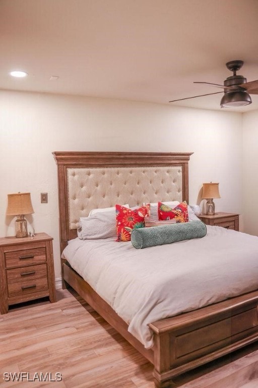 bedroom with light wood finished floors, ceiling fan, and recessed lighting