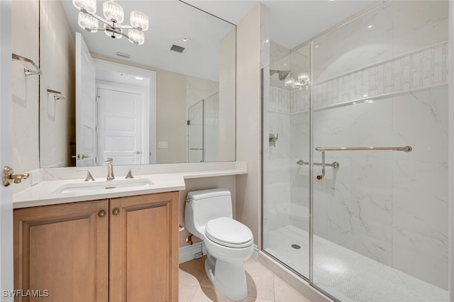 full bathroom with tile patterned flooring, toilet, a notable chandelier, vanity, and a marble finish shower