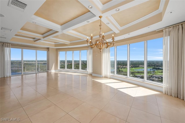 unfurnished room featuring light tile patterned floors, a wealth of natural light, visible vents, and an inviting chandelier