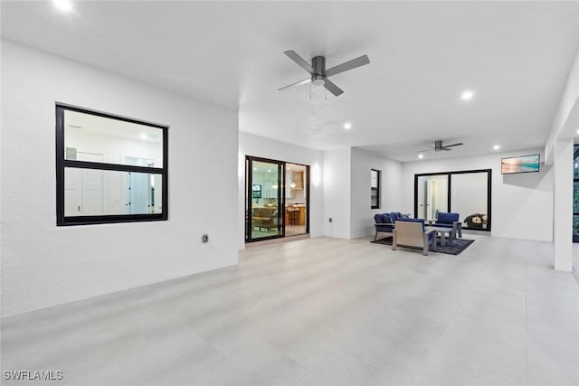 view of patio with ceiling fan and an outdoor hangout area