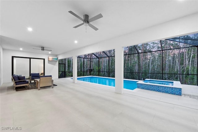 view of pool featuring ceiling fan, a lanai, a patio, and an outdoor hangout area