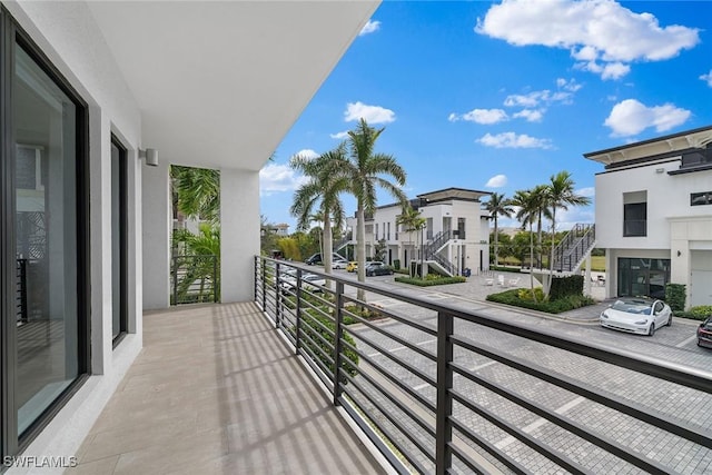 balcony featuring a residential view