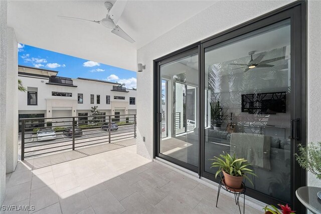 balcony with a ceiling fan