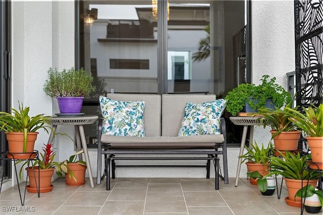 balcony with a patio and an outdoor living space