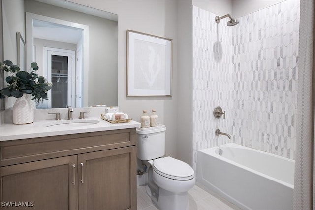 bathroom with toilet, vanity, and shower / bathtub combination