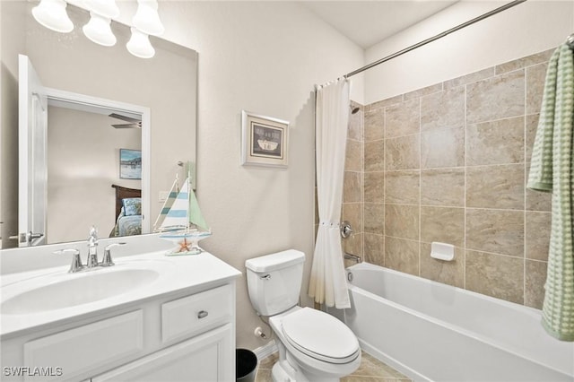 bathroom with toilet, tile patterned floors, shower / bath combo with shower curtain, and vanity