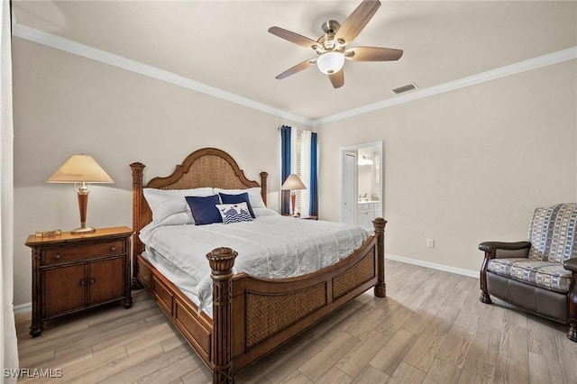 bedroom with ornamental molding, light wood-type flooring, visible vents, and baseboards