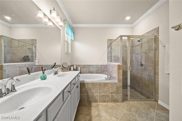 full bath with a stall shower, crown molding, and a sink