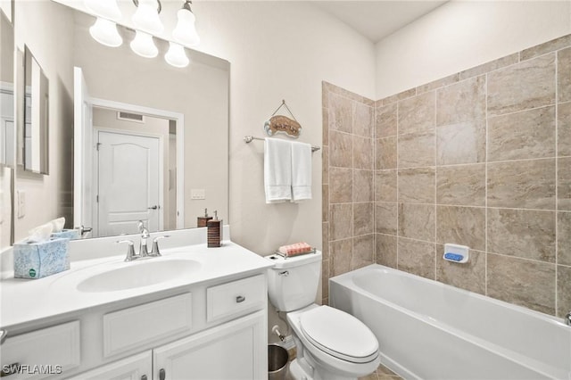 full bath with toilet, shower / bath combination, visible vents, and vanity