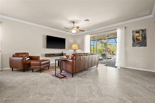 living room with a ceiling fan, visible vents, crown molding, and baseboards