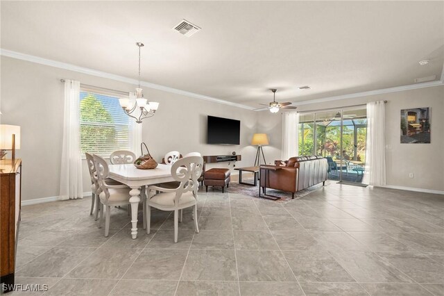 dining area with visible vents, ornamental molding, baseboards, and ceiling fan with notable chandelier