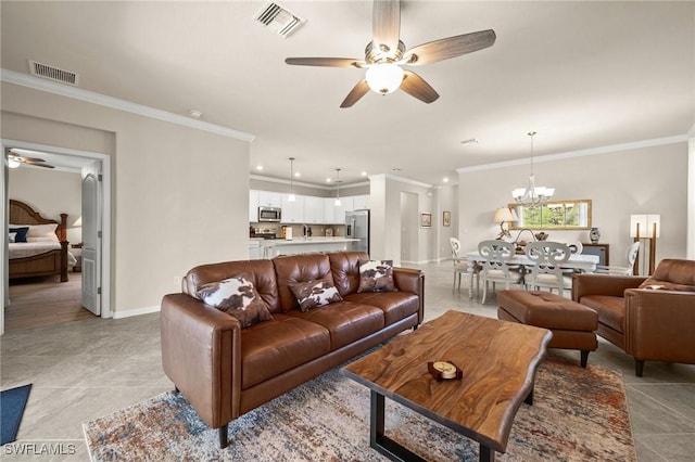 living area featuring ceiling fan with notable chandelier, visible vents, and crown molding