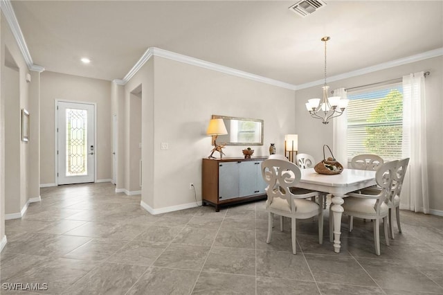 dining area featuring a chandelier, visible vents, crown molding, and baseboards