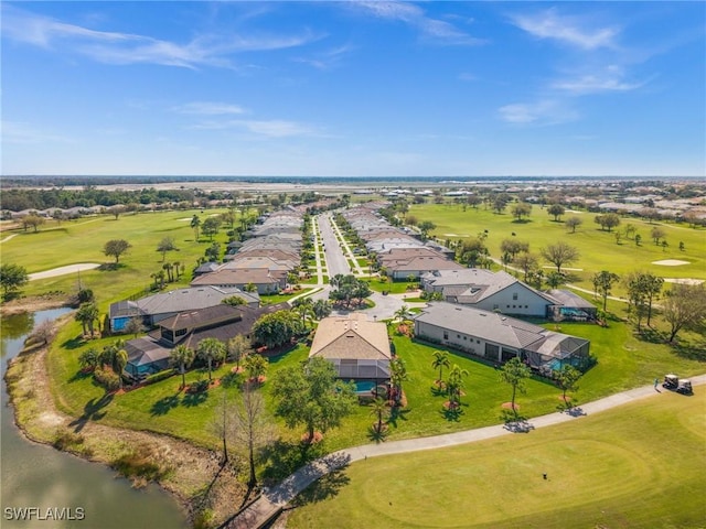 bird's eye view with a residential view, a water view, and golf course view