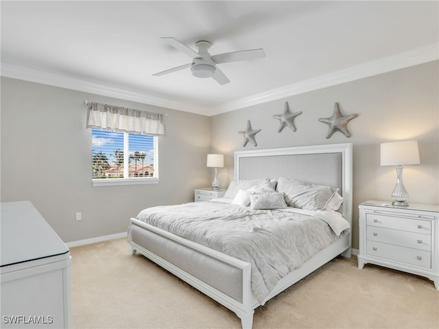 bedroom with light carpet, ceiling fan, ornamental molding, and baseboards