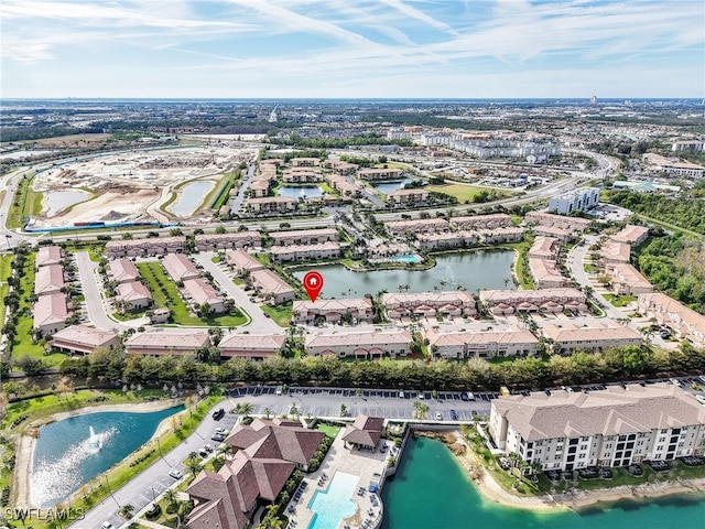 bird's eye view with a water view