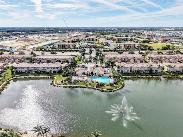 aerial view featuring a residential view and a water view