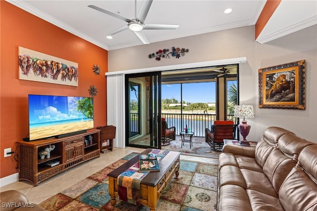 living room featuring tile patterned flooring, ornamental molding, and a ceiling fan