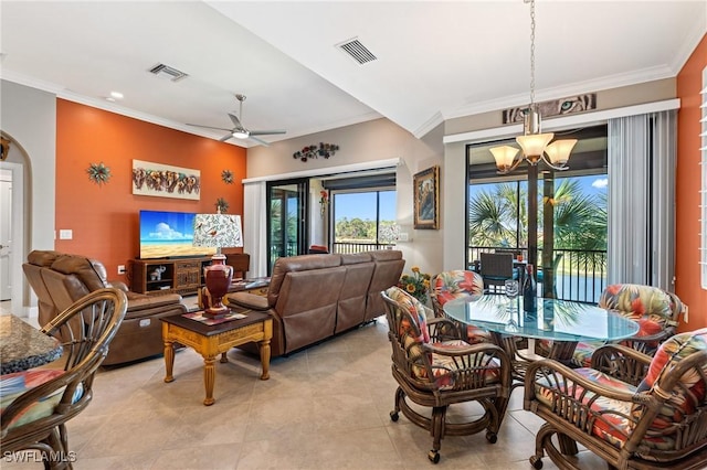 dining room featuring ceiling fan with notable chandelier, ornamental molding, and visible vents