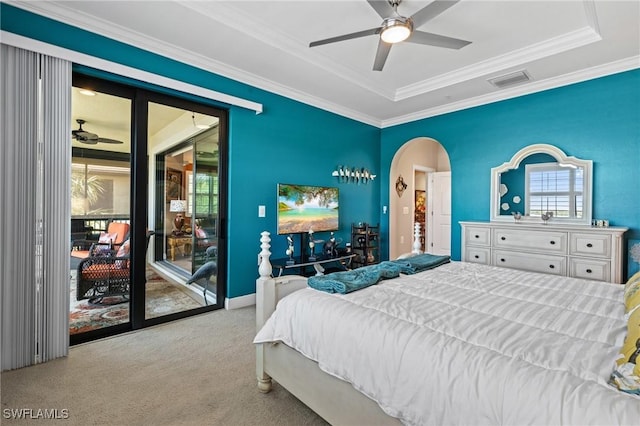 bedroom with access to outside, multiple windows, visible vents, and arched walkways