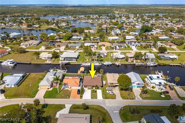 aerial view with a water view and a residential view